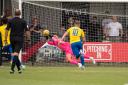 Tom Parker-Trott in action for Wimborne against Dorchester