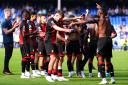 Bournemouth players celebrate victory after the final whistle in the Premier League match at Goodison Park, Liverpool. Picture date: Saturday August 31, 2024.