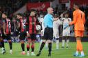 AFC Bournemouth v Chelsea  at Vitality Stadium.. Referee Anthony Taylor talks tocheklsea goalie Robert Sanchez while Evanilson waits to take the penalty.