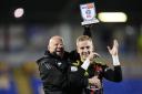 Exeter City goalkeeper Joe Whitworth (right) celebrates with kit manager Keith Stone after the Sky Bet League One match at The Croud Meadow stadium, Shrewsbury. Picture date: Thursday October 17, 2024.