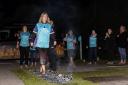 Fire walkers brave the coals to raise more than £10,000 for hospice