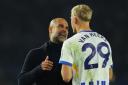 Manchester City manager Pep Guardiola and Albion's van Hecke