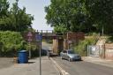 Van crashes into railway bridge and blocks road - updates