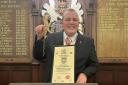 Joshua Denning with his Freedom scroll and the keys to the town