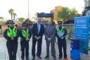 David Sickwick and Andy Bell pictured with knife arch and officers