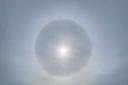 'I was hoping it was a port hole to Ibiza' Halo sun captured in Bournemouth