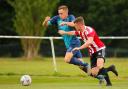 Asa Phillips in action for Merley Cobham Sports against Shaftsbury..