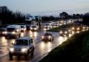 Queueing traffic on busy road following an accident