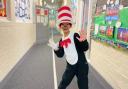 A student at Cheam Common Junior Academy in Surrey dressed as The Cat in the Hat (PA)