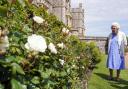 Queen Elizabeth II views a border in the gardens of Windsor Castle, in Berkshire (PA)