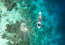 People kayaking in the Maldives. Credit: Canva