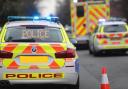 Road blocked after crash involving two cars