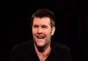 Rhod Gilbert reveals cancer diagnosis and tells fans he is 'disappearing for a while'. (PA)