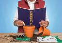 Generic picture of a gardener reading a gardening book. See PA Feature GARDENING Advice Book. Picture credit should read: Alamy/PA.