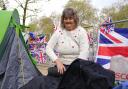 Kim Bilson, from Poole, who is already in position along The Mall in central London ahead of the coronation.