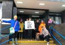 Protesters gathered outside Weymouth Magistrates' Court in solidarity with Ellie Litten (right)