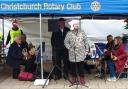 Rotary President Peter Boardman listens to Cllr. Viv. Charrett