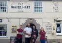 CJ and his partner, Anne Marie (centre) with new staff at The White Hart