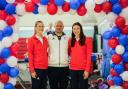 Bryony Page (left) and Izzy Songhurst (right) celebrating with coach Brian Camp