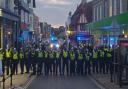 Officers at the protest in Weymouth on Sunday.