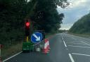 Temporary traffic lights on the A35 past Lytchett Minster