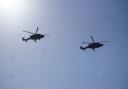 Two Black Cats helicopters flew over the opening ceremony.