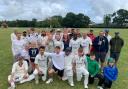 The teams at the Cllr Charles Baker memorial cricket match.