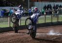 Poole Pirates Speedway v  Workington Comets  in Championship play-off semi-final 1st leg at Wimborne Road. Heat 5 - Ben Cook (red) and Zach Cook (blue)