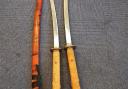 Two men arrested after police seize large samurai swords in West Howe