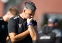 Wimborne Manager Tim Sills contemplating the score line. Wimborne Town 0-2 Weston Super Mare Played at Wyatt Home Stadium, Wimborne Saturday 14September 2024.  Photo by Steve Harris