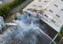 30 firefighters tackle huge derelict building fire as investigation begins