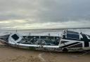 Atlantic Challenge rowing boat stranded on Bournemouth beach