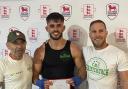 Sam Carr receiving his south eastern title certificate with John Woods and Joe Hayes