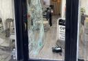 Smashed door at Boss Barber