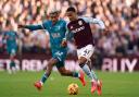 Bournemouth's Julian Araujo and Aston Villa's Jacob Ramsey (right) battle for the ball during the