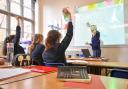 A teacher and students in a classroom