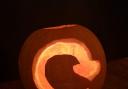 Pumpkin with recycle logo carving