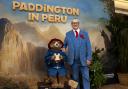 Hugh Bonneville with Paddington at the world premiere of Paddington In Peru (Ben Whitley/PA)