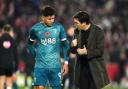 Bournemouth manager Andoni Iraola (right) and player Francisco Evanilson after the final whistle in