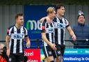 Goals from Matty Burrows (centre) and Jack Lovell weren't enough as Wimborne lost 3-2 to Marlow. File photo.