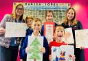 (From left to right) Jo Saunders, Marketing and Communications Manager at the DCCF, Heatherlands Primary School art ambassador Franklin, Year 3 competition winner Alex, Year 5 winner Grace, Year 1 winner Charlie and Sammy Bumford, DCCF Ambassador