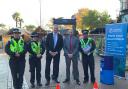 David Sickwick and Andy Bell pictured with knife arch and officers