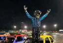 Teen takes junior banger world title in storm-hit race