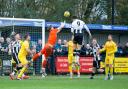 Will Fletcher beats Dorchester keeper Benfield to put Wimborne 1 up.