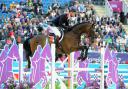 MEDAL TRIUMPH: William Fox-Pitt in action on Lionheart in this afternoon's showjumping round at Greenwich Park