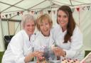 TREATS: Jo Wheatley, winner of the 2011 Great British Bake-off, joins fellow judges Jenny Budzynski and Mary Reader in judging the entries in the baking competition