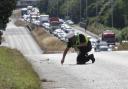 File image of a police officer at a crash