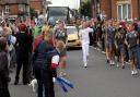 REALISING A DREAM: Nathan Bailey carried the Olympic torch through Boscombe ahead of London 2012. Now, he's heading to Rio.