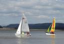 WE ARE SAILING: Sailors enjoying calm waters