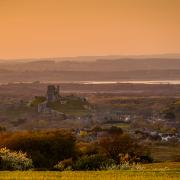 Richard Murgatroyd of the Echo Camera Club posted this view of Corfe Castle looking across towards Poole Harbour as the sun sets..